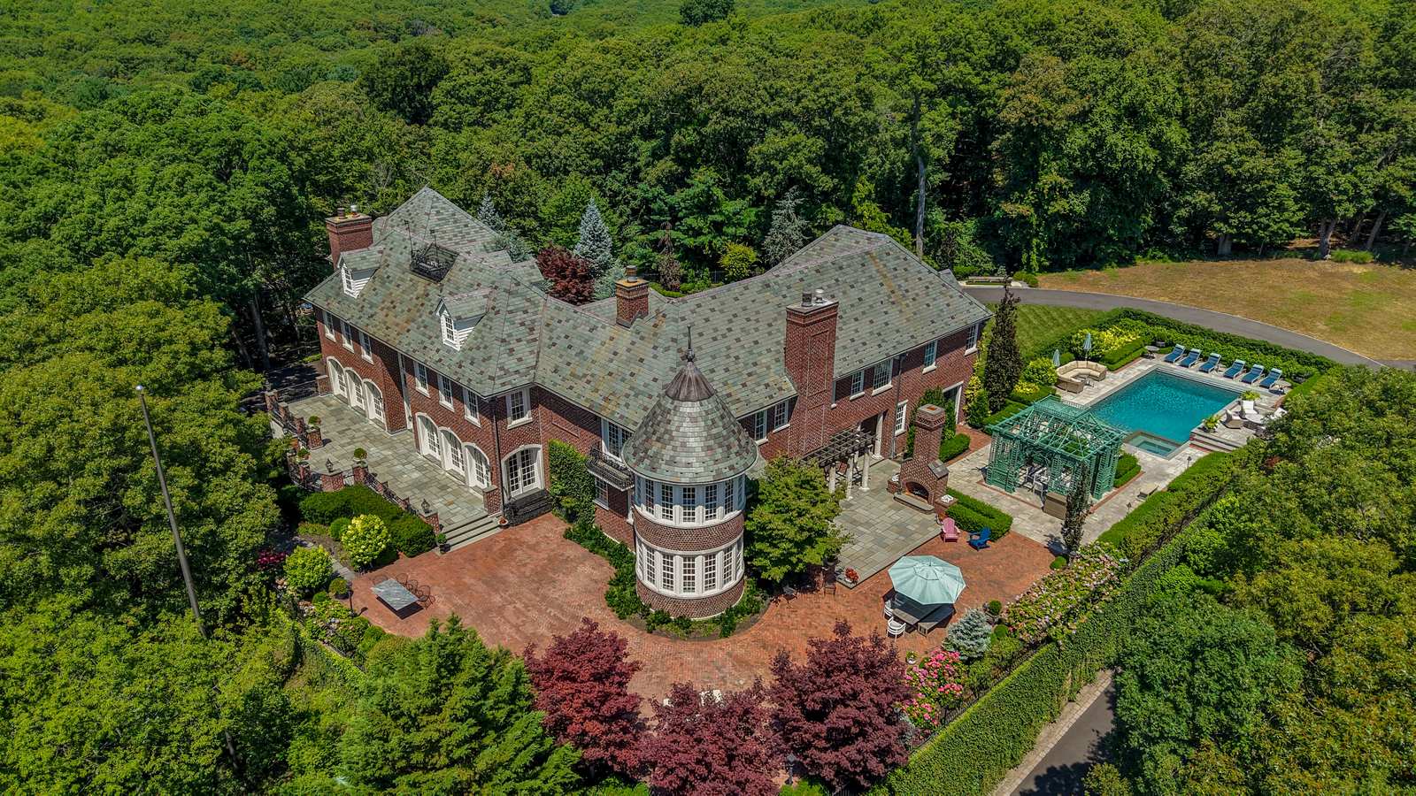 Aerial view of an estate with pool and gardens, listing photography, Suffolk County