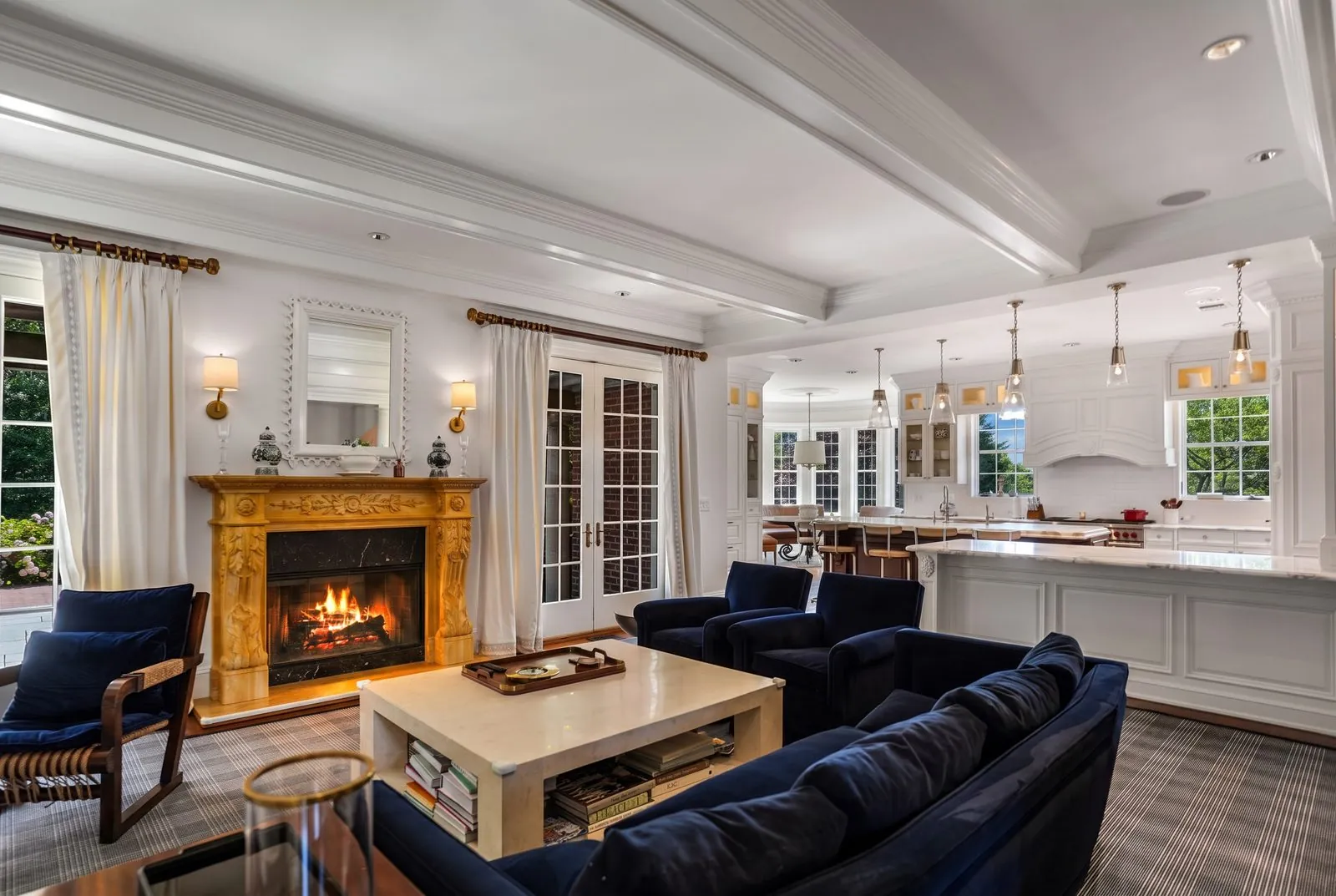 Great room with a fireplace open to the kitchen, real estate interior photography, Suffolk County
