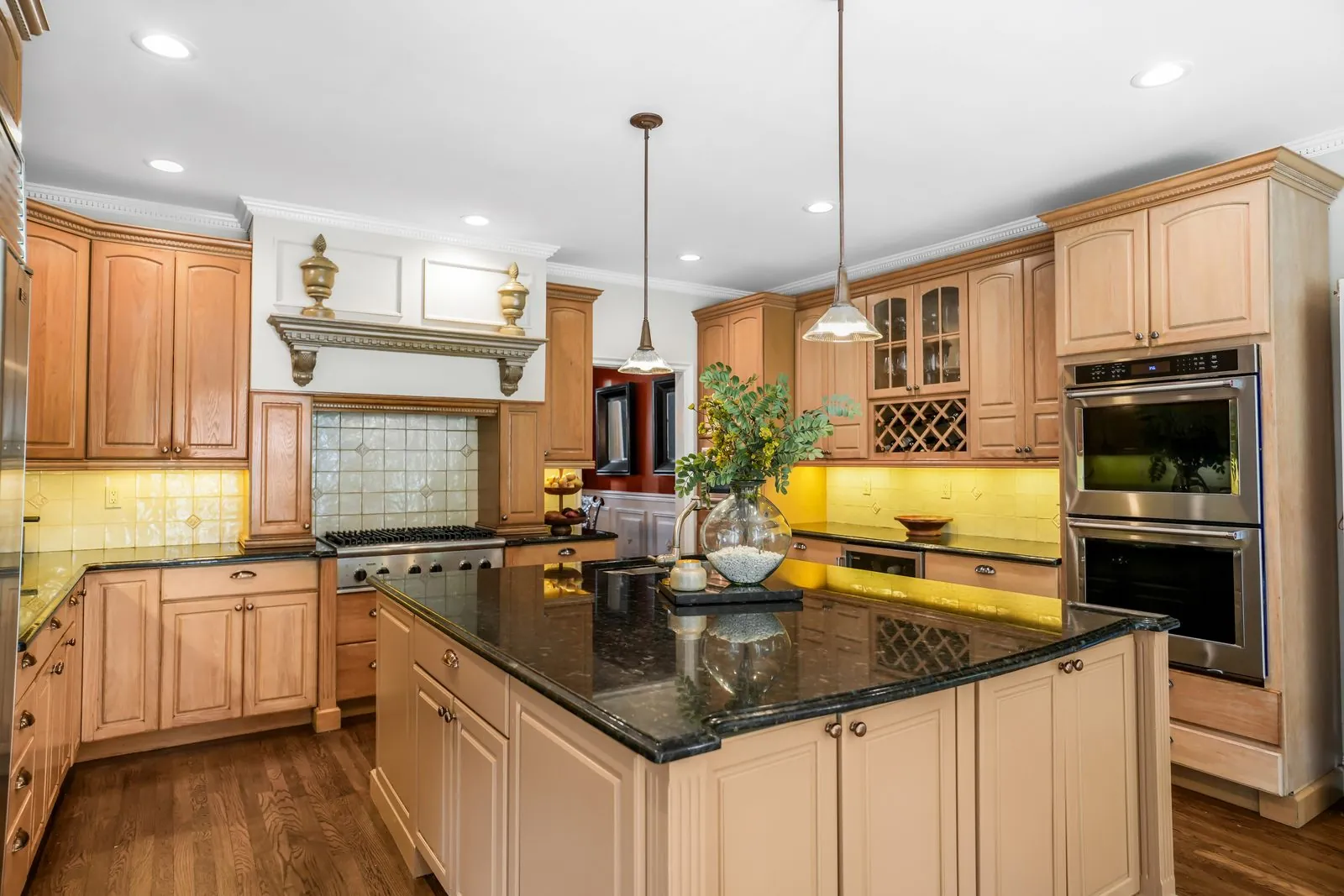 Kitchen with a granite island and double ovens, real estate interior photography, Suffolk County